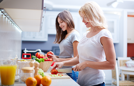 Imagem de listagem de mulheres a cozinhar